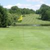A view of hole #4 with water in background at Green Ridge Golf Club
