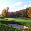 A fall view of green protected by bunkers at Blackhead Mountain Lodge & Country Club