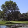 A view over the water of green at Western Turnpike Golf Course
