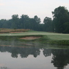 A view over the water of the 14th green at Rome Country Club
