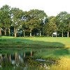 A view of green surrounded by water at Clearview Park Golf Course